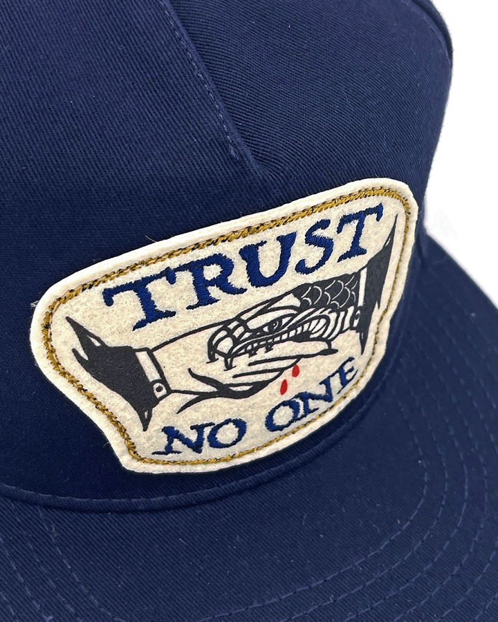 Trust No One Handshake Hat-Sticks & Stones-Strange Ways