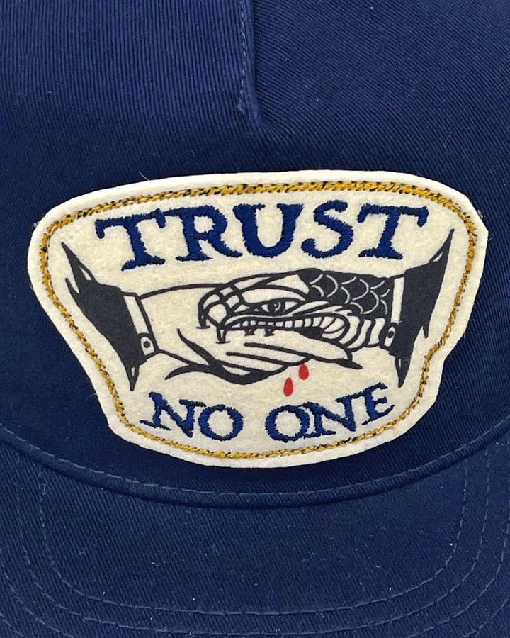 Trust No One Handshake Hat-Sticks & Stones-Strange Ways