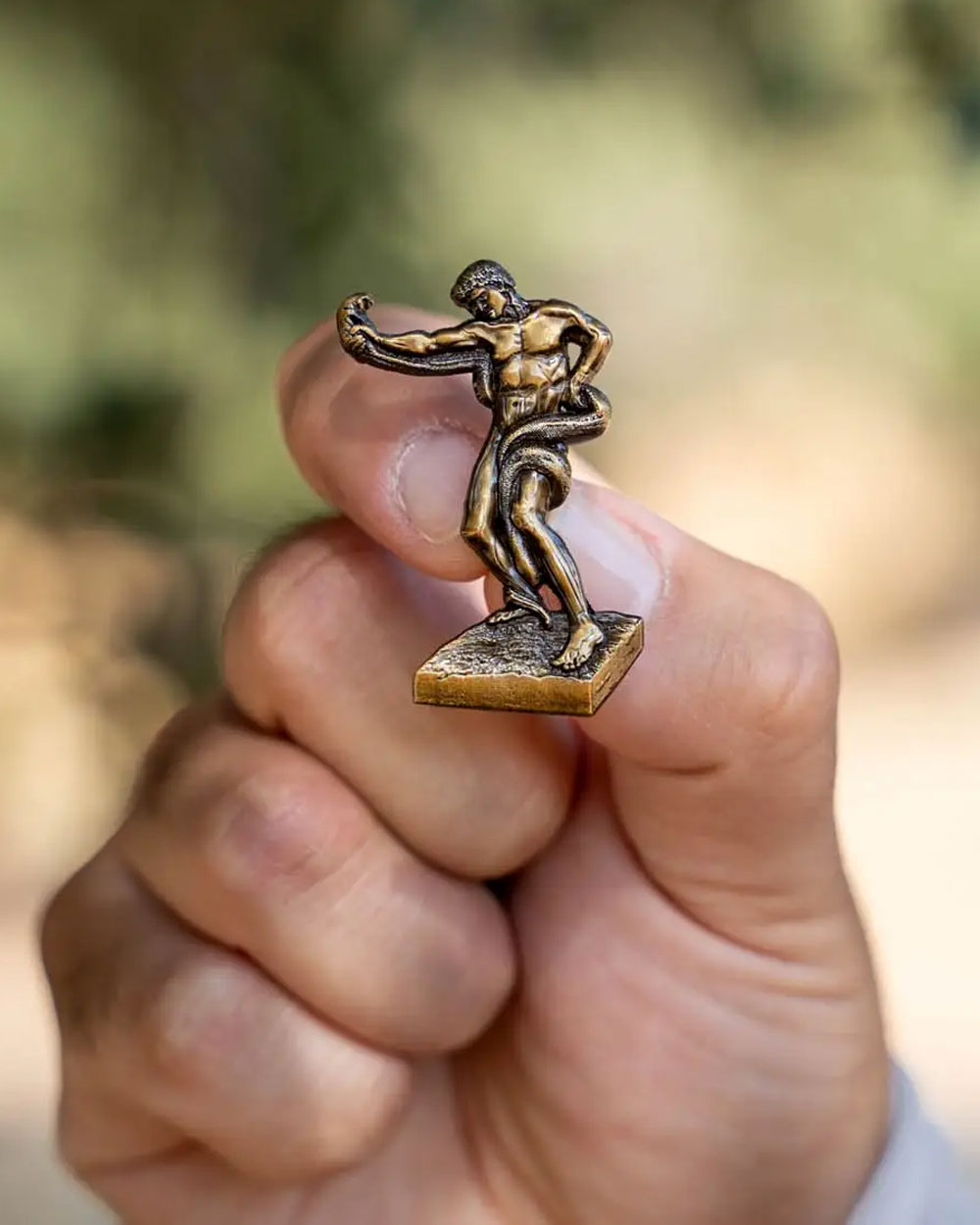 Leighton's An Athlete Wrestling with A Python Pin