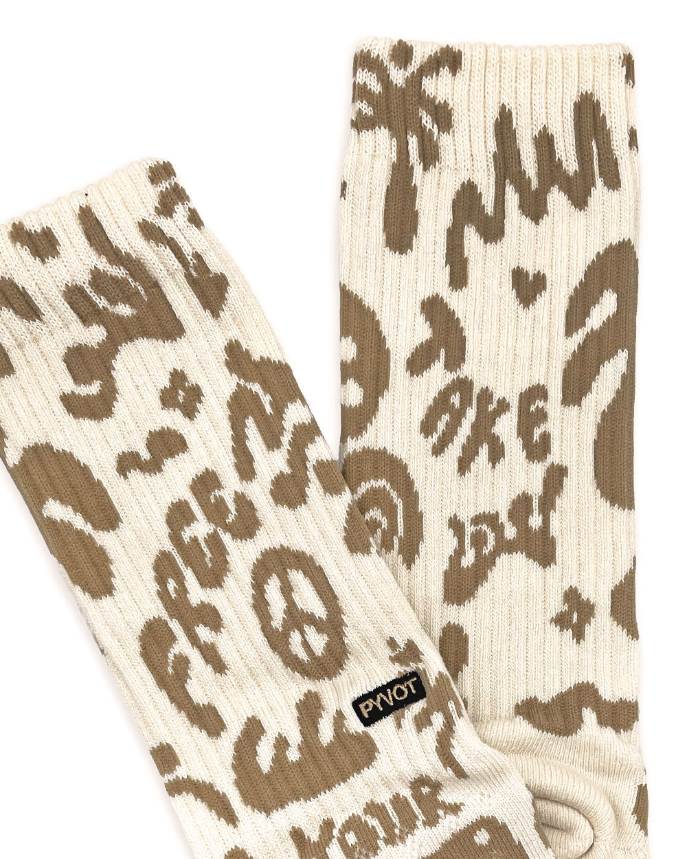 Cream and brown leopard graphic crew socks, logo patch on side.