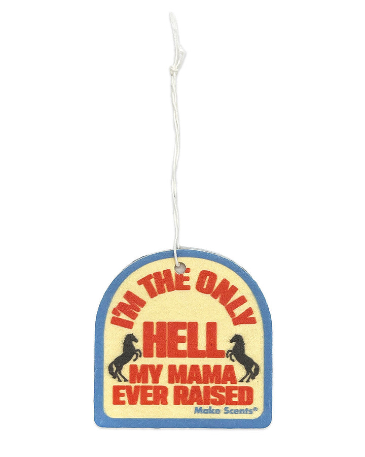Hanging air freshener shaped like surf wax label, blue border with red text