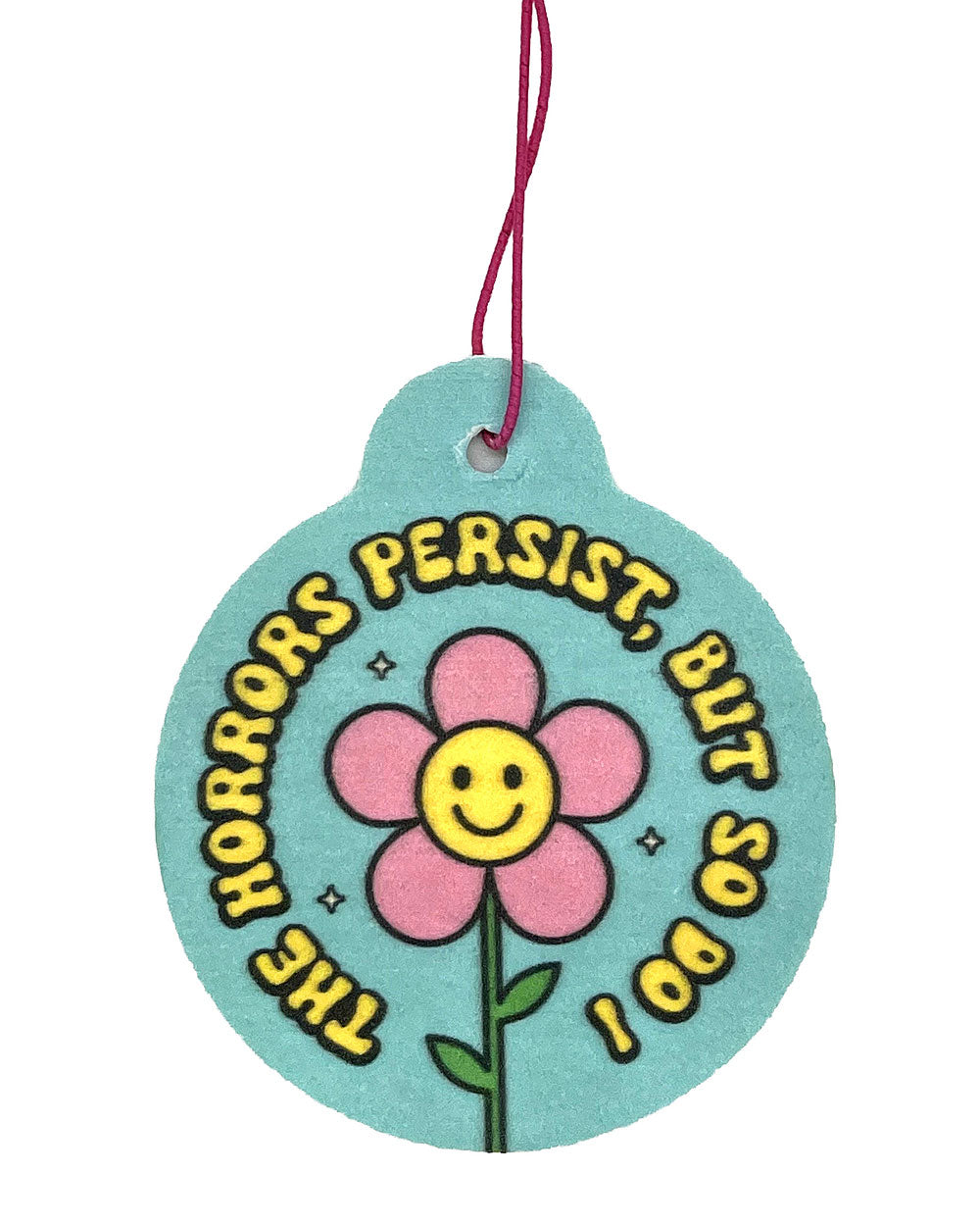 Teal round air freshener with flower face, hanging string, and 'Horrors Persist, But So Do I'.