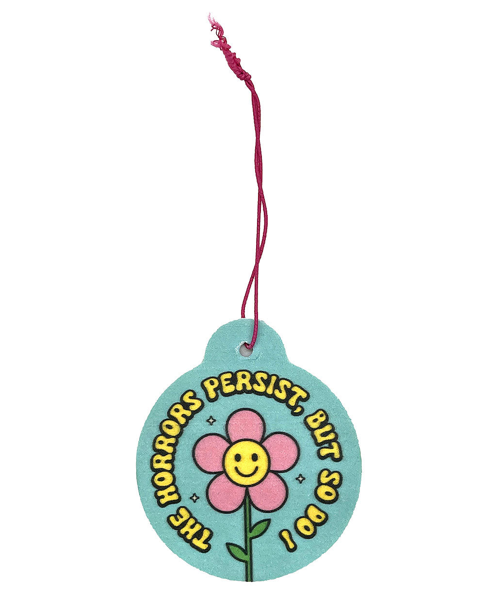 Round teal hanging air freshener with flower graphic and 'Horrors Persist, But So Do I'.