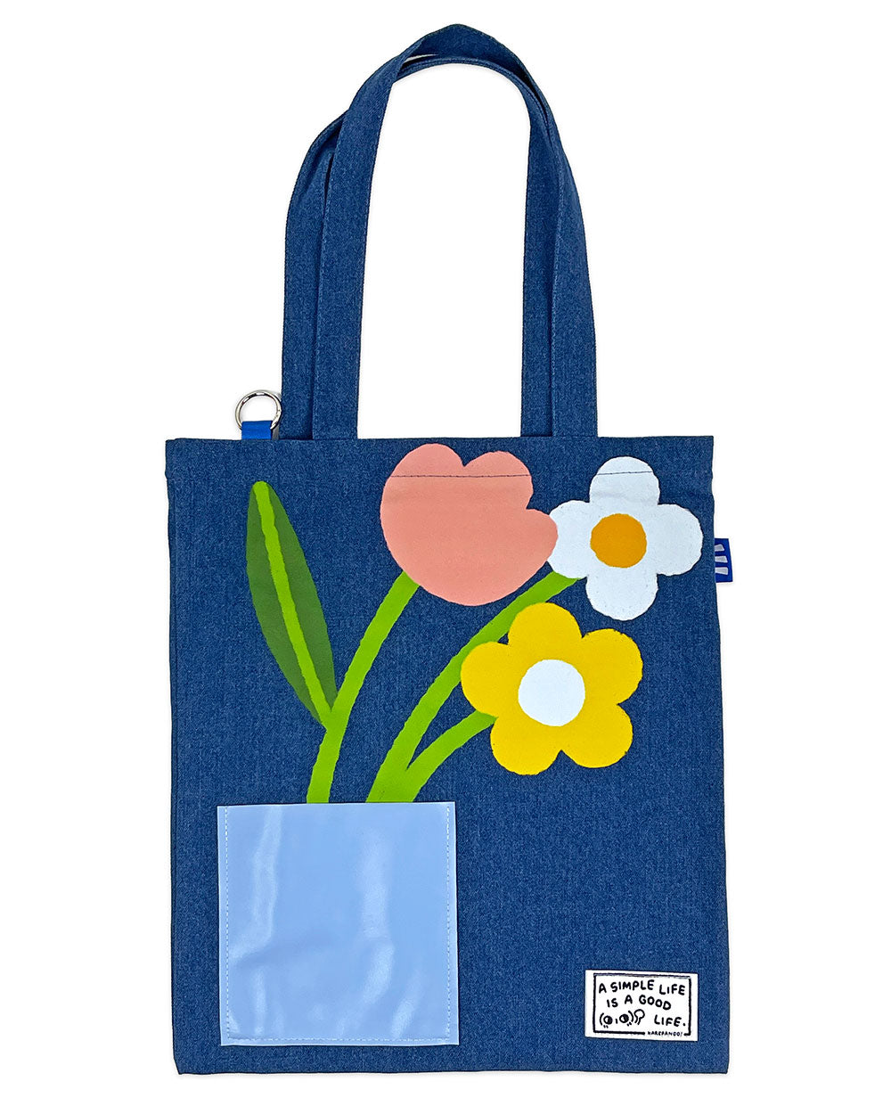 Denim tote bag with top handle, front flower appliques, and rectangular front pocket