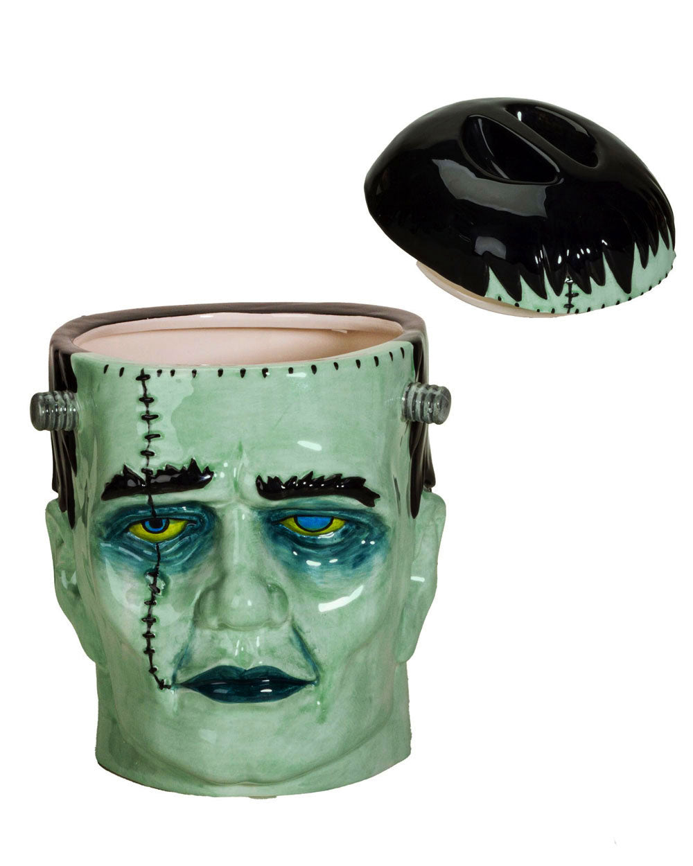 Frankenstein-style cookie jar with removable lid, green face and blue eyes.