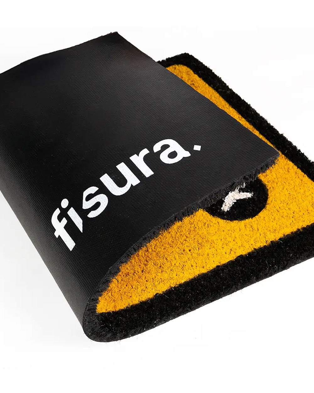 Corner close-up of yellow doormat with black border and white 'fisura' text.