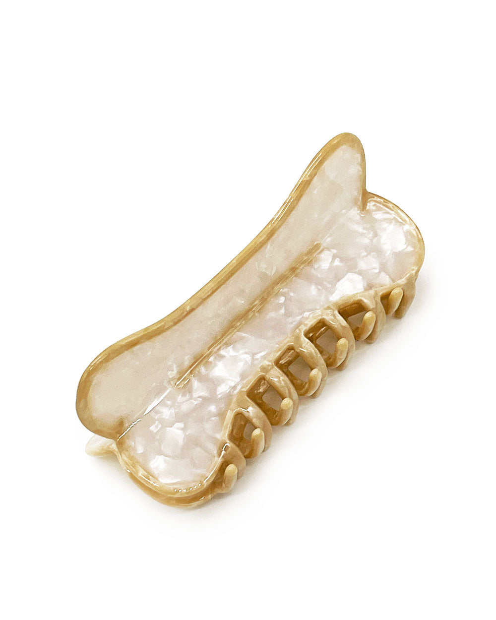 Translucent cream resin hair claw clip with gold-tone teeth, curved oval shape