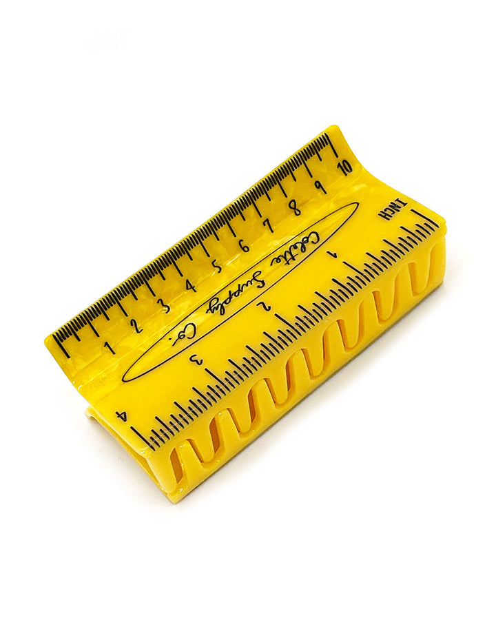 Yellow ruler hair claw clip with serrated grip teeth