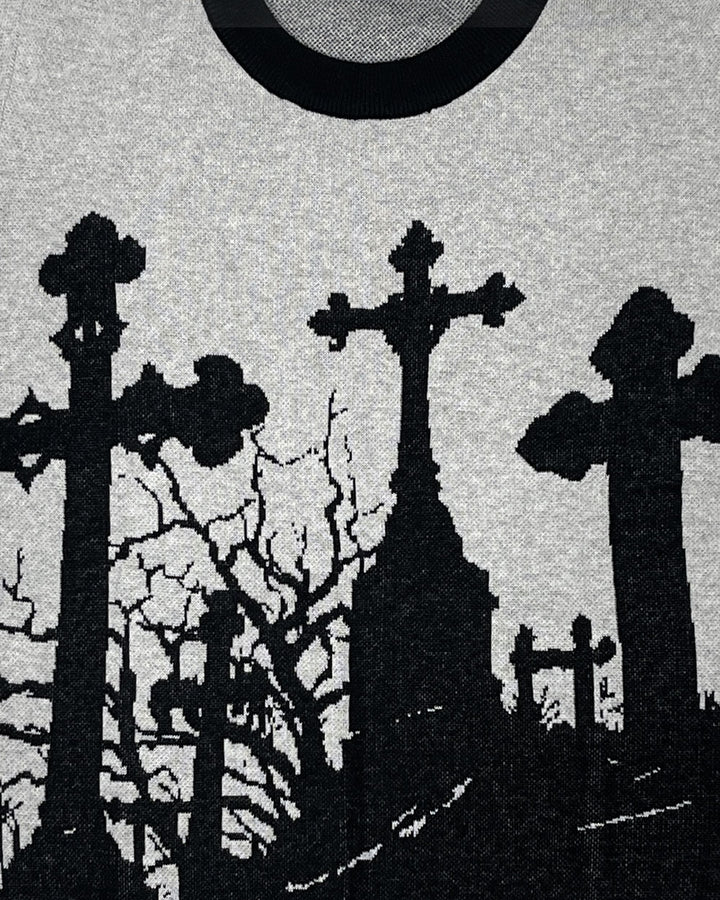 Close-up: heather gray crewneck knit sweater with black gravestone fence graphic