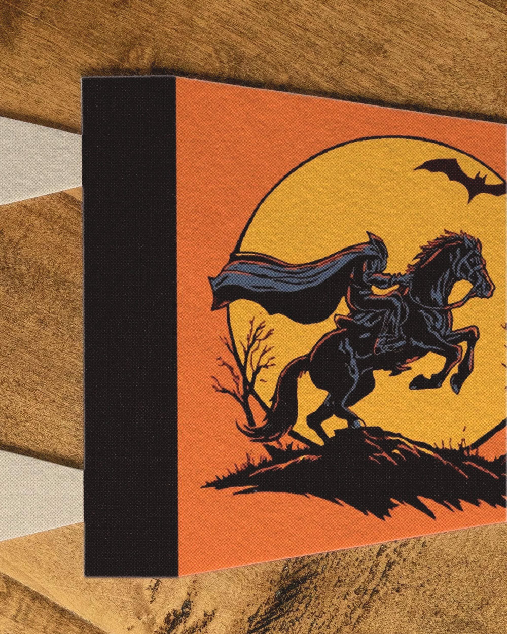 Mini pennant with black edge strip, orange panel featuring rider-and-horse graphic