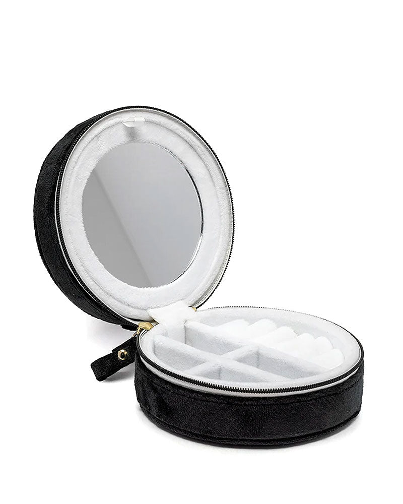 Black round zip jewelry case with open top and white foam compartments