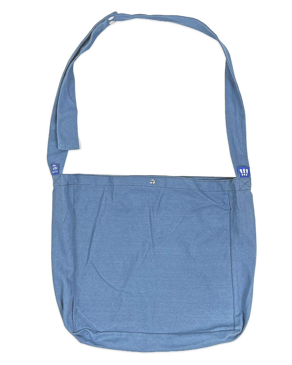 Blue denim tote bag with long handles and simple back panel with stitched trim