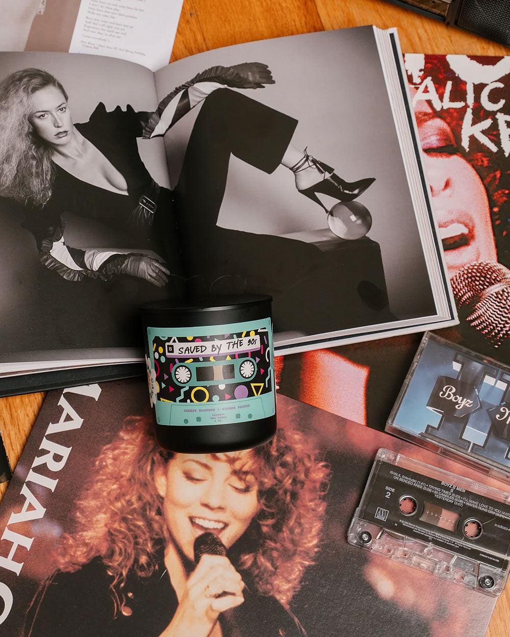 Save By The 90s candle in black jar with cassette-style label