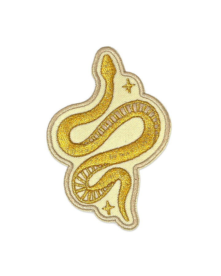 Gold snake-shaped embroidered patch with swirl details and small star accents