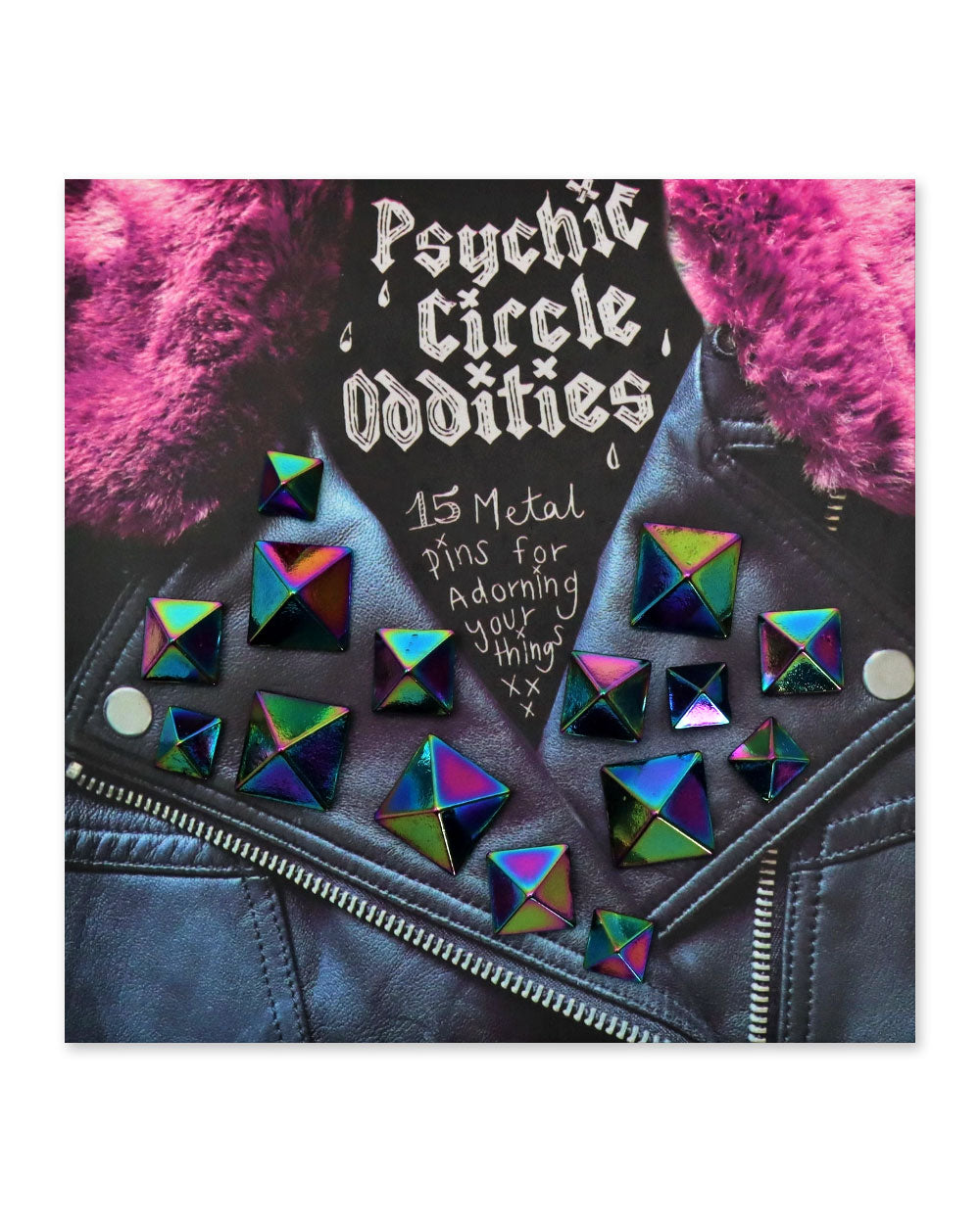 Iridescent pyramid metal stud pins shown on a card, 15-pack