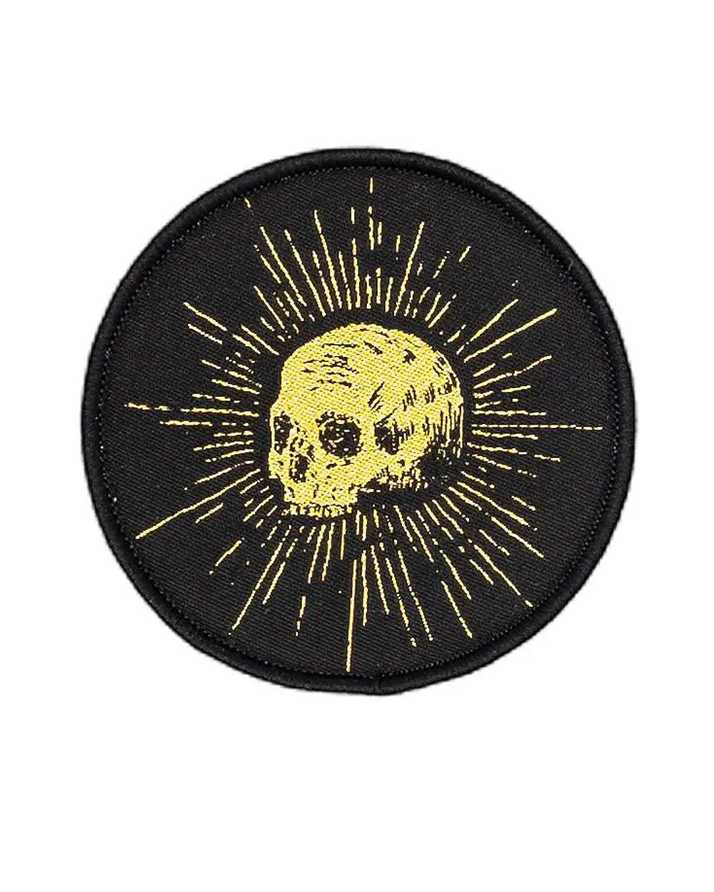 Round black embroidered patch with gold skull and sunburst rays