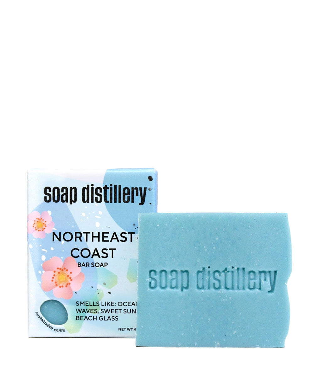 Blue bar soap with 'soap distilvery' text, shown with bar soap package