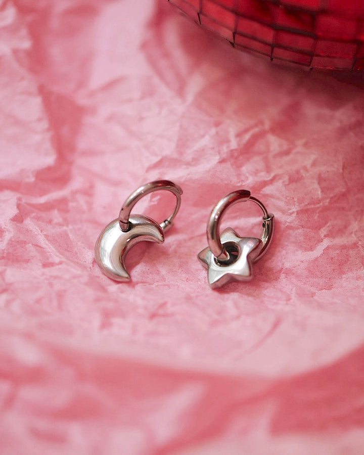 Silver-tone crescent moon charm hoop earrings, open-circle design