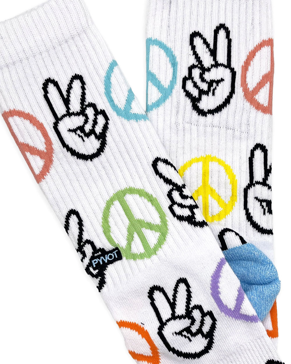 White crew socks with peace-hand and peace-sign graphics, ribbed knit close-up