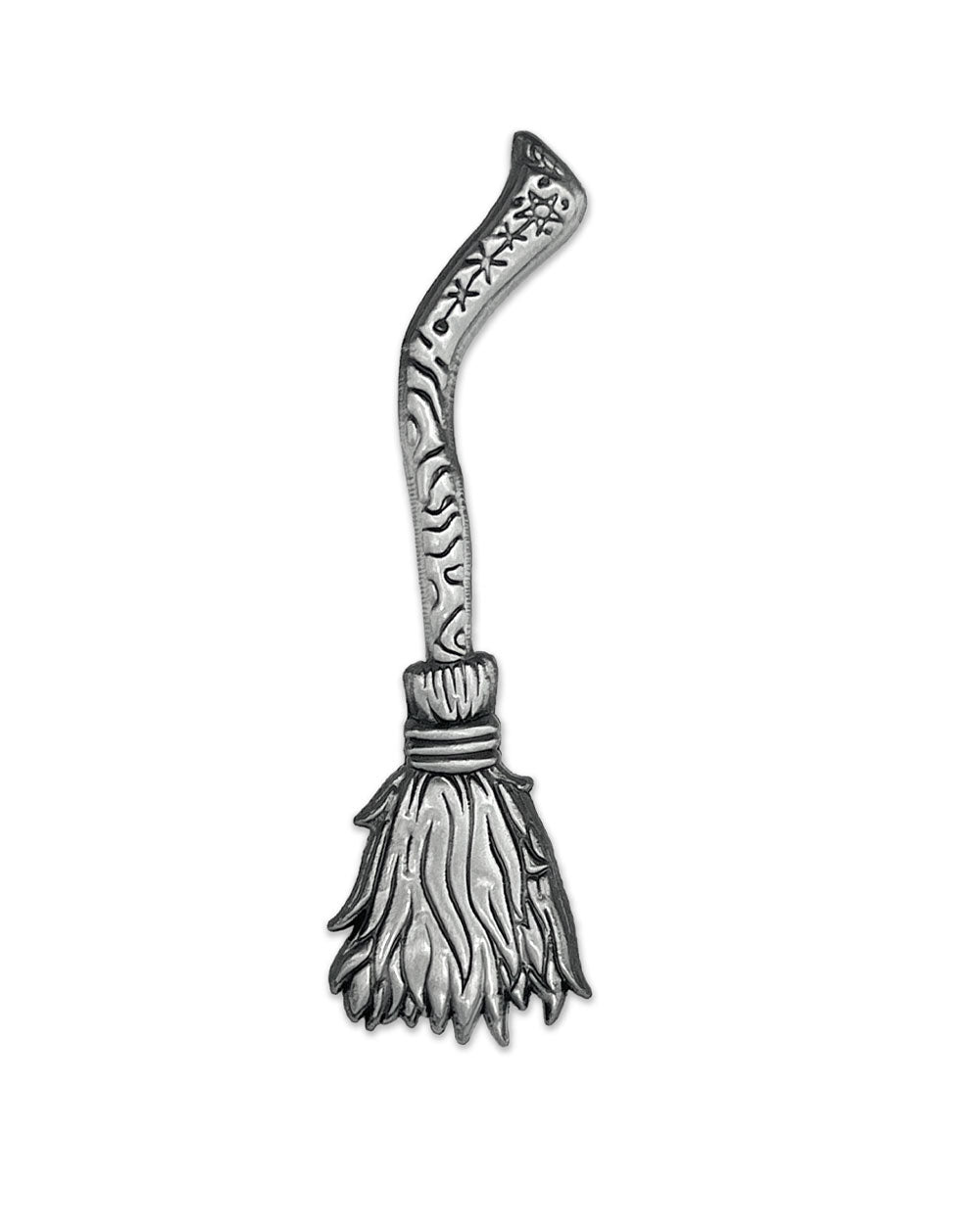 Silver-tone witch broom lapel pin with detailed bristles and curved handle